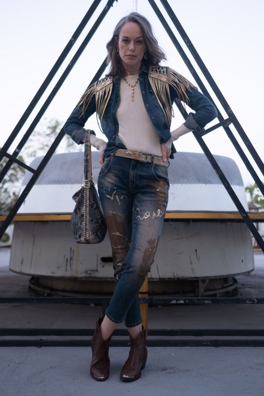 Jean bleu coupe slim en denim stretch avec imprimé graffiti doré